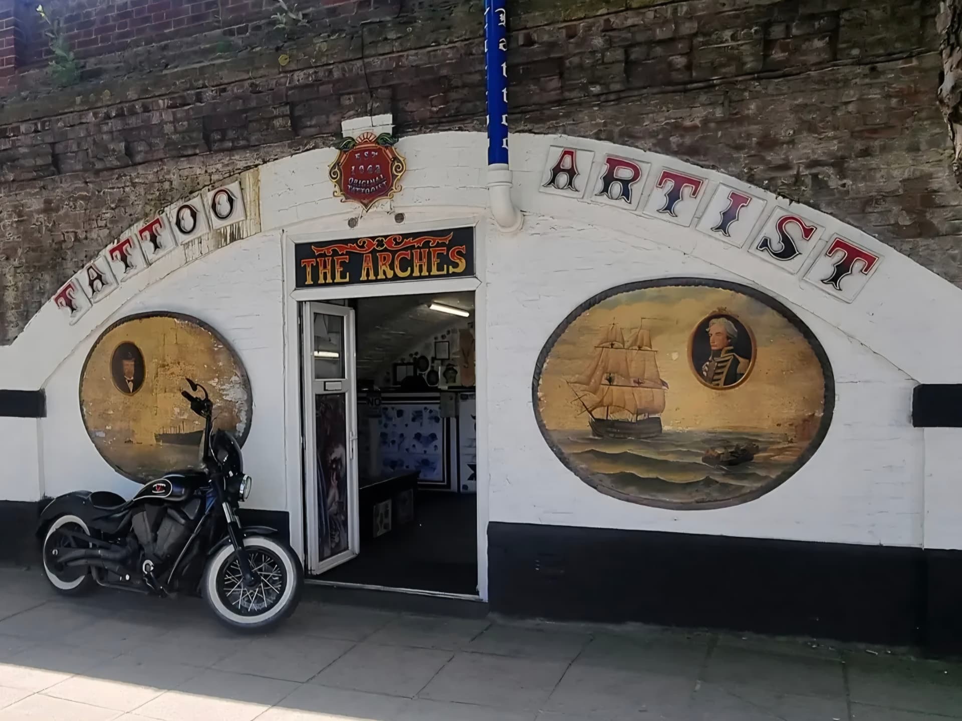 The Arches Tattoo Studio shopfront on The Hard, Portsmouth